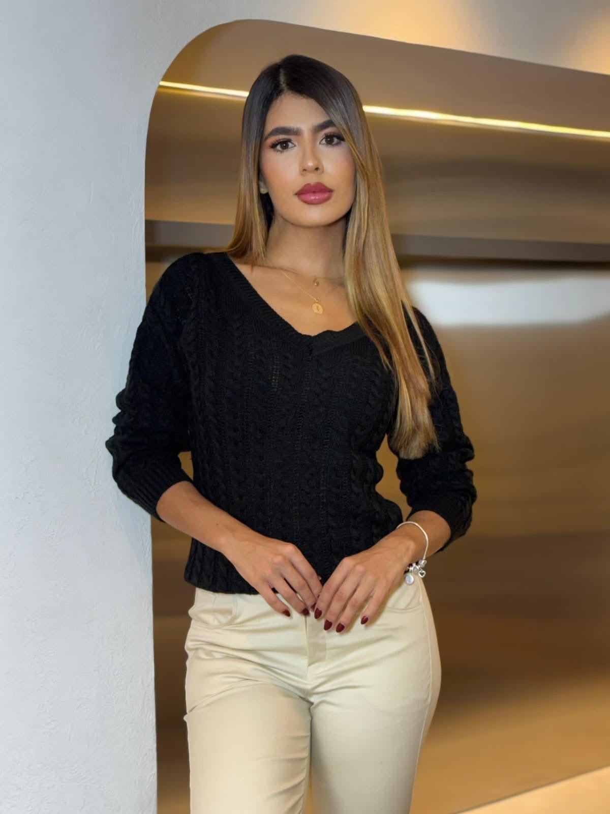 Suéter cuello V clásic