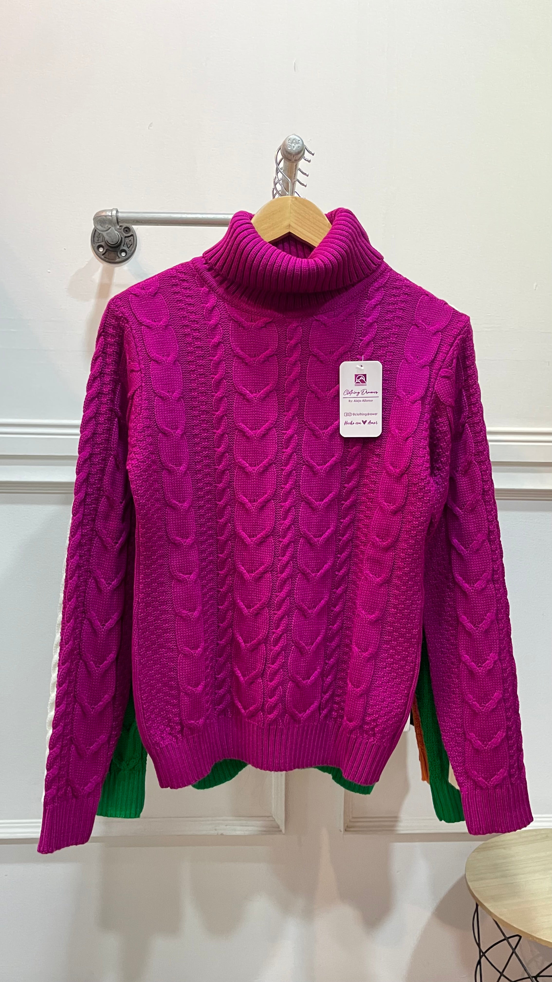 Suéter cuello alto trenza