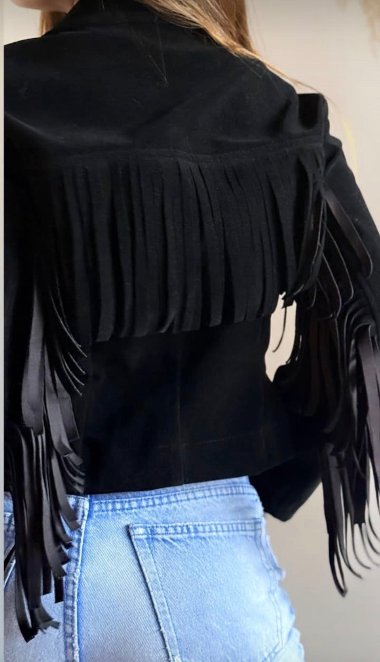 Chaqueta flecos gamuza