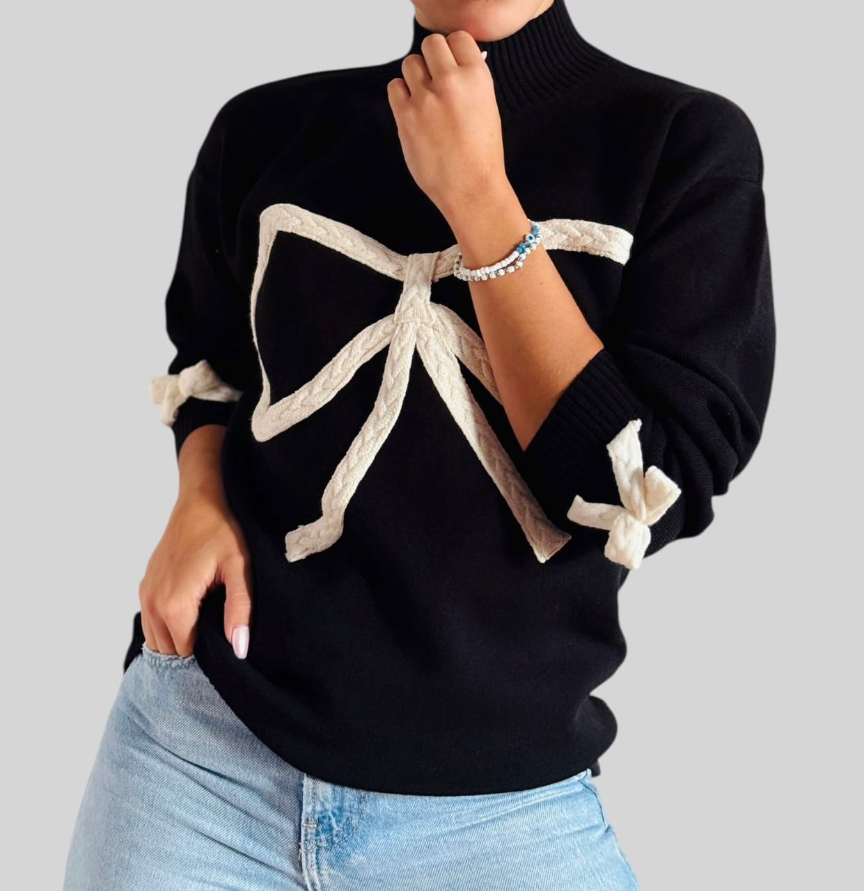 Suéter moños