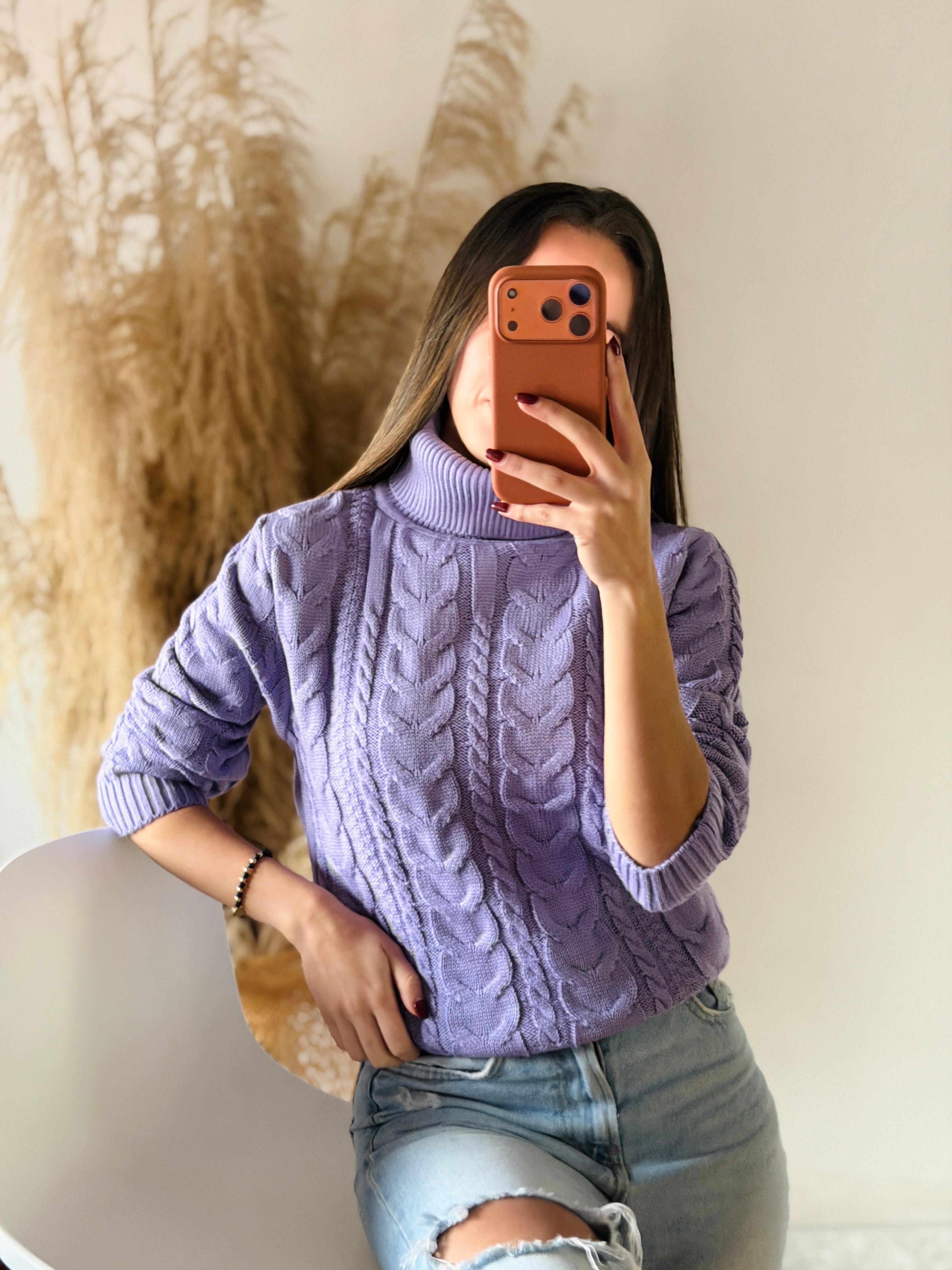 Suéter cuello alto trenza