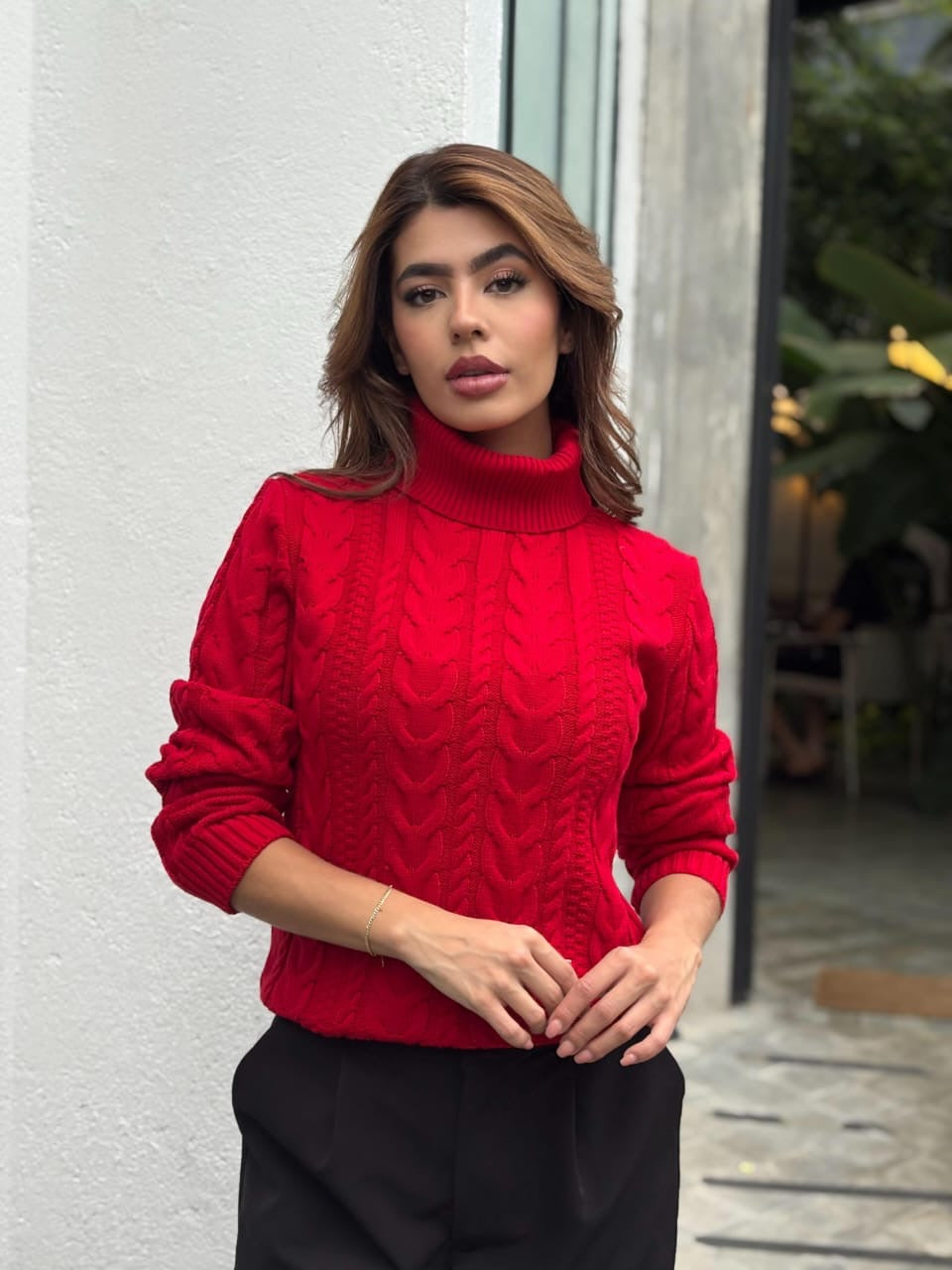Suéter cuello alto trenza