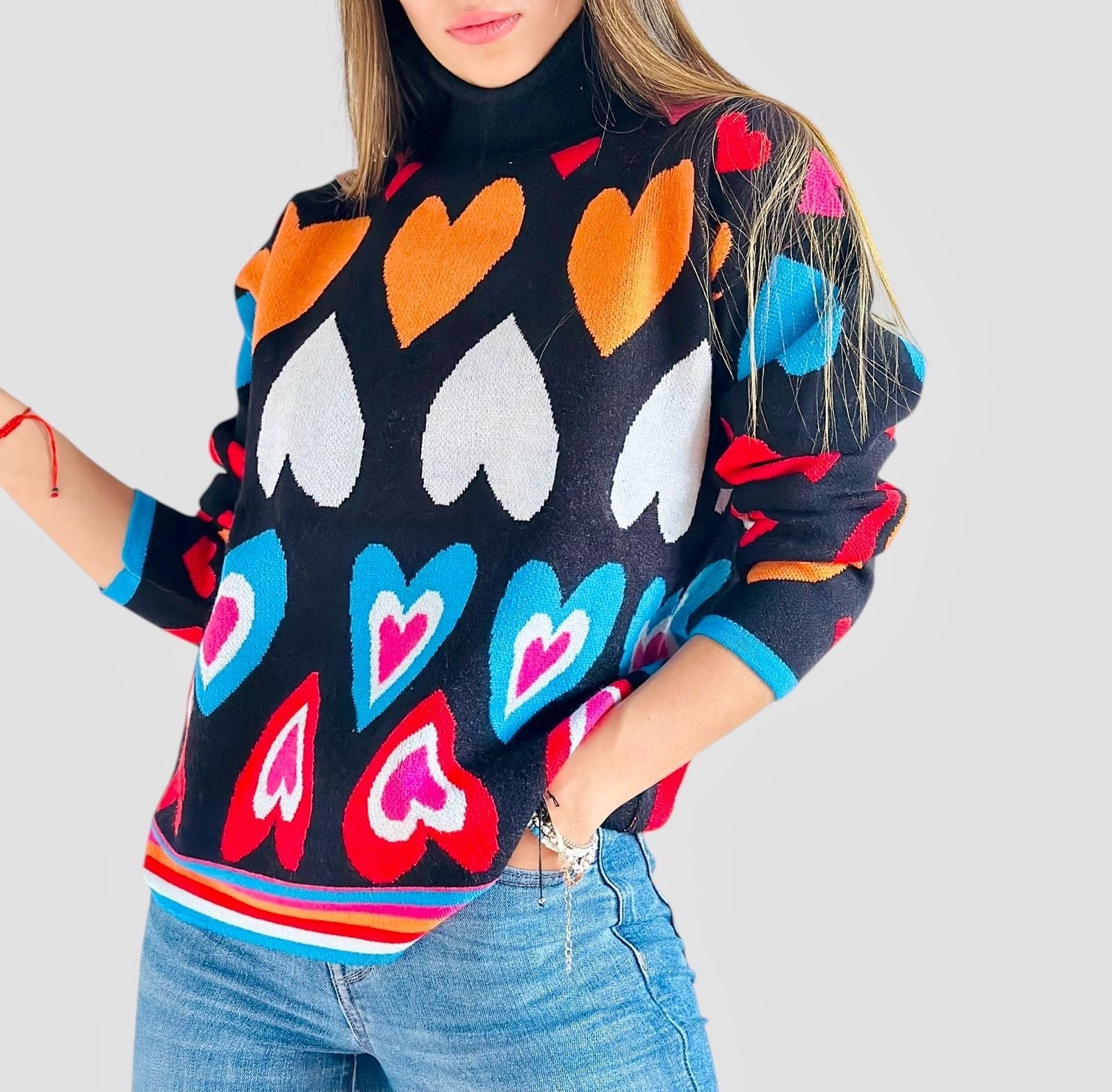 Suéter cuello alto corazones