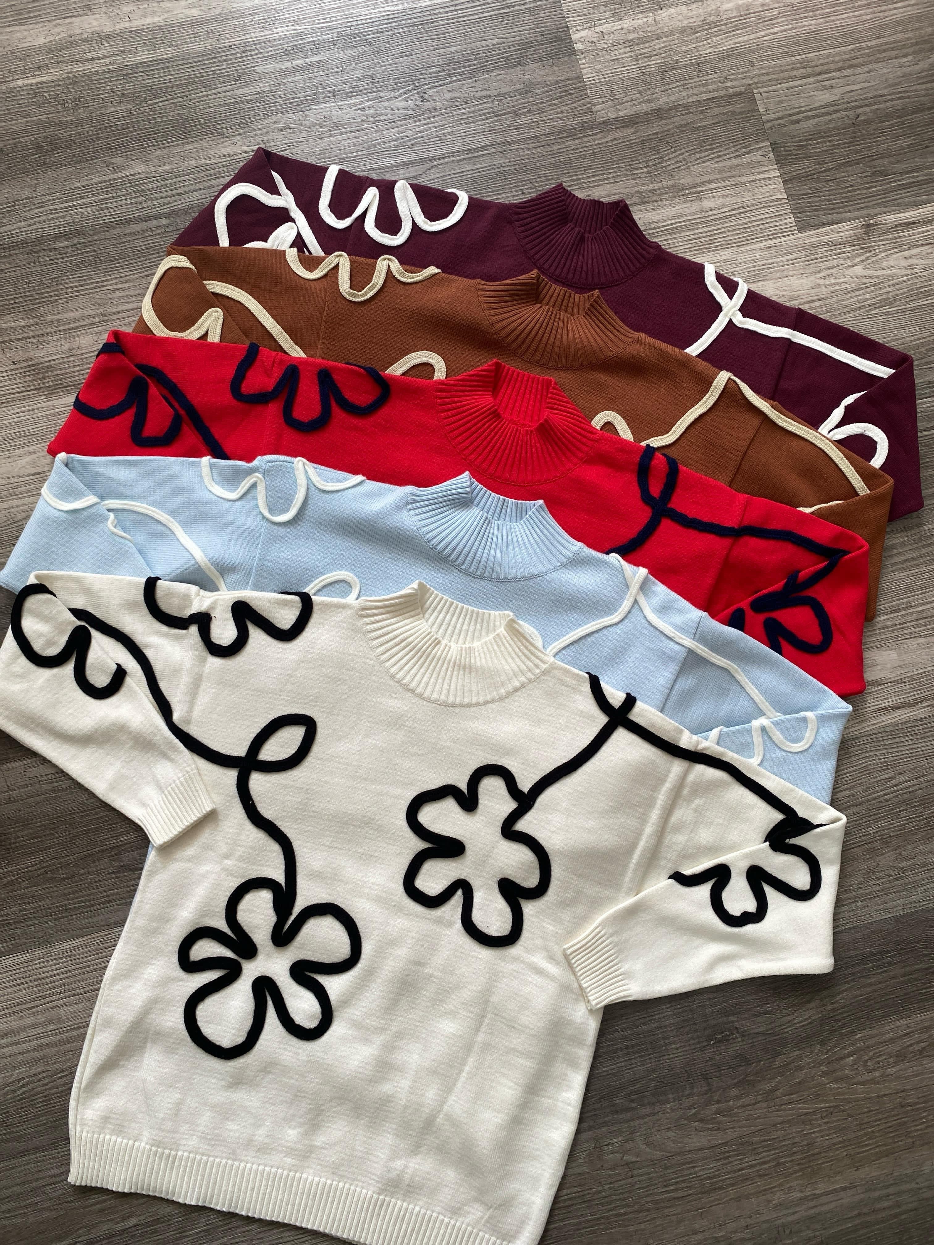 Suéter flor bordada