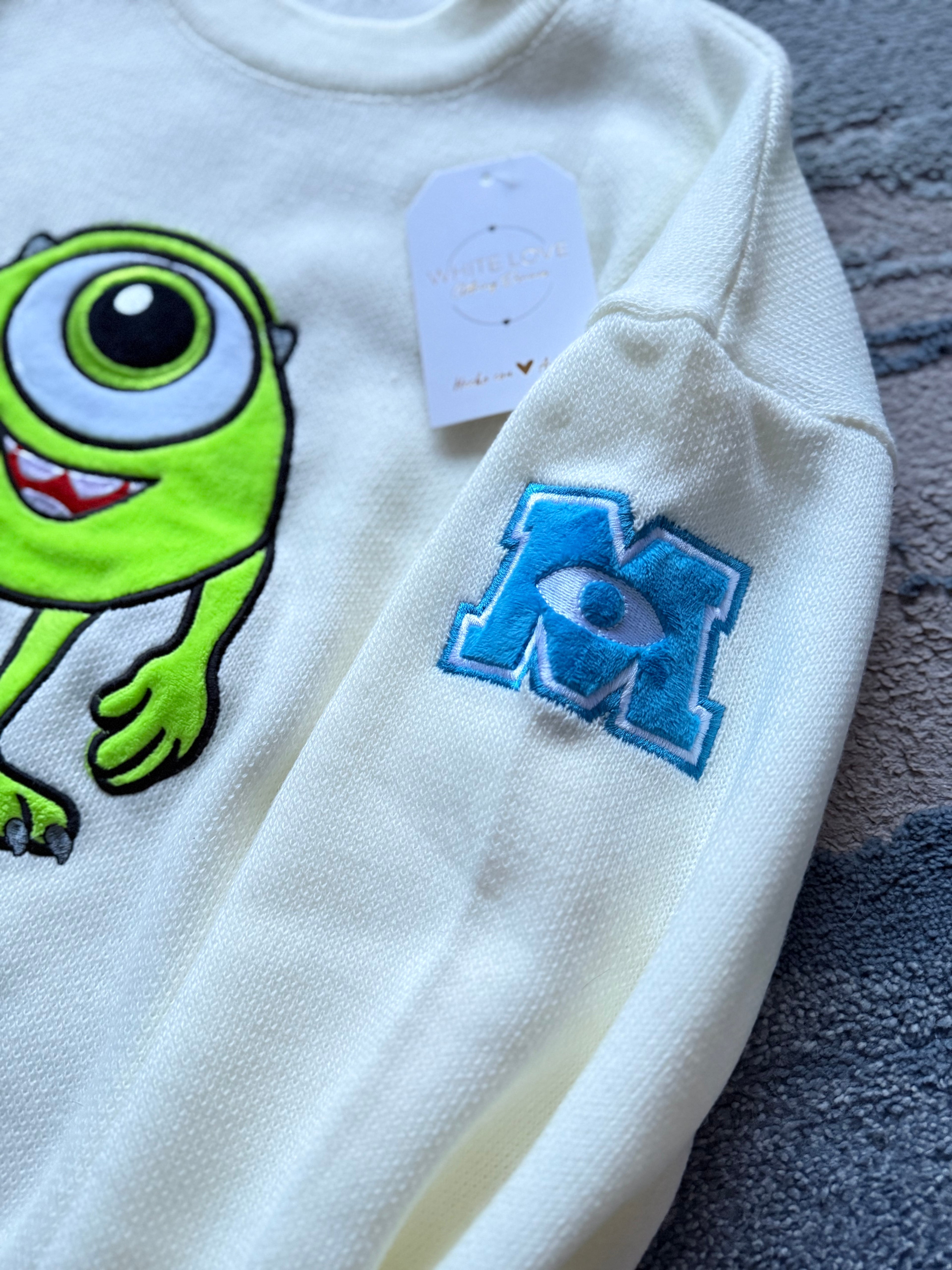 Suéter bordado Mike wasowski