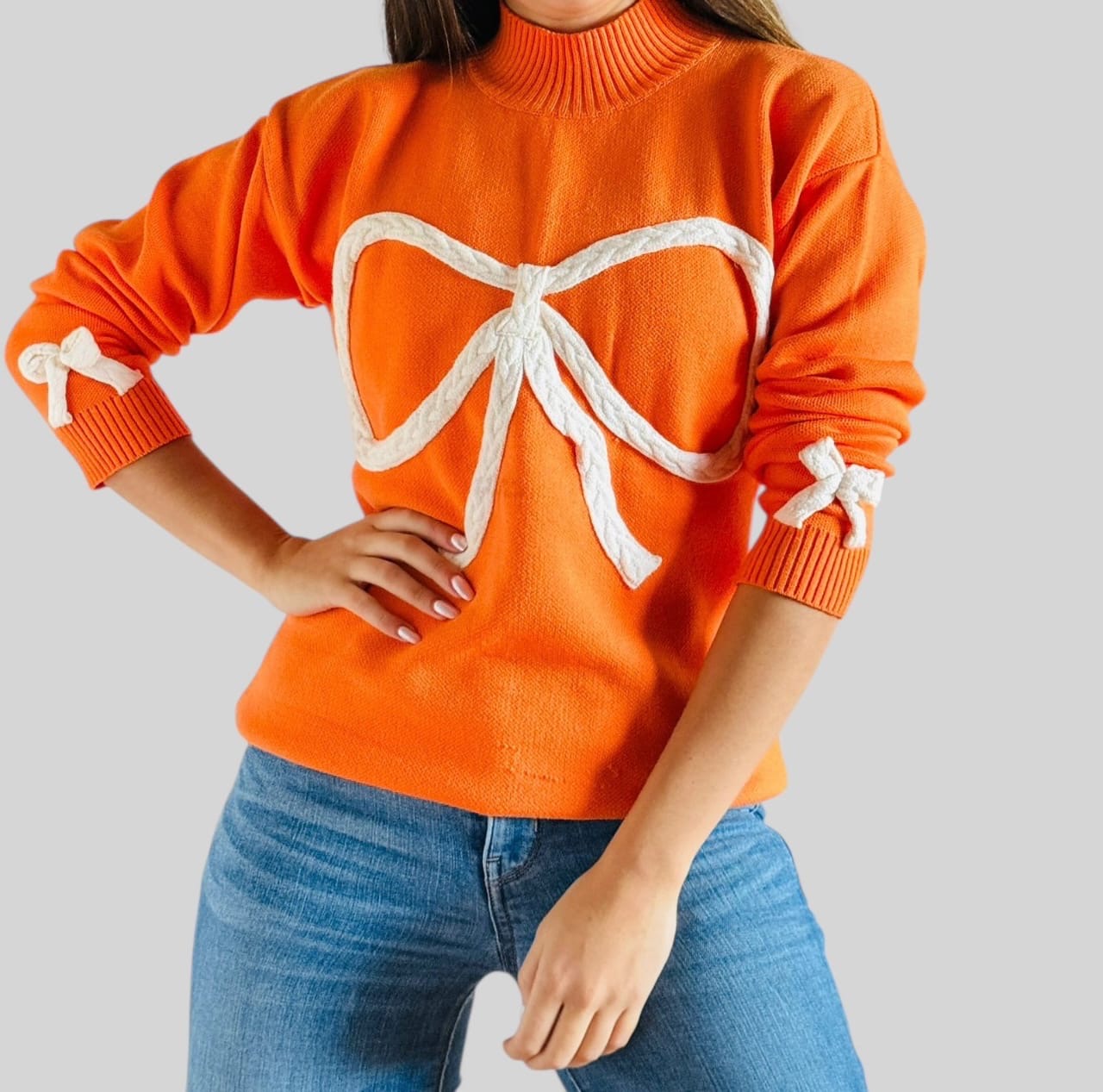 Suéter moños