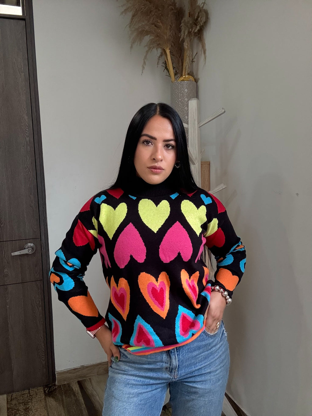 Suéter cuello alto corazones